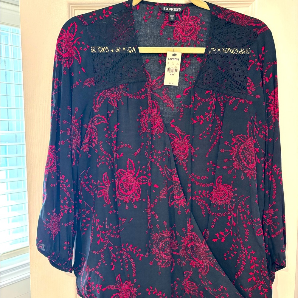 Express blouse size medium with tags.